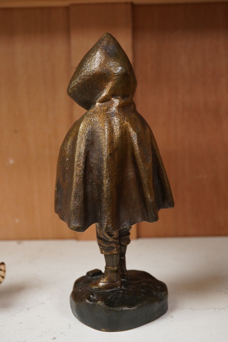 An Art Deco bronze and ivory figure of a boy wearing a cloak, signed Chopard, 22cm high CITES Submission reference, B3J6ULYT